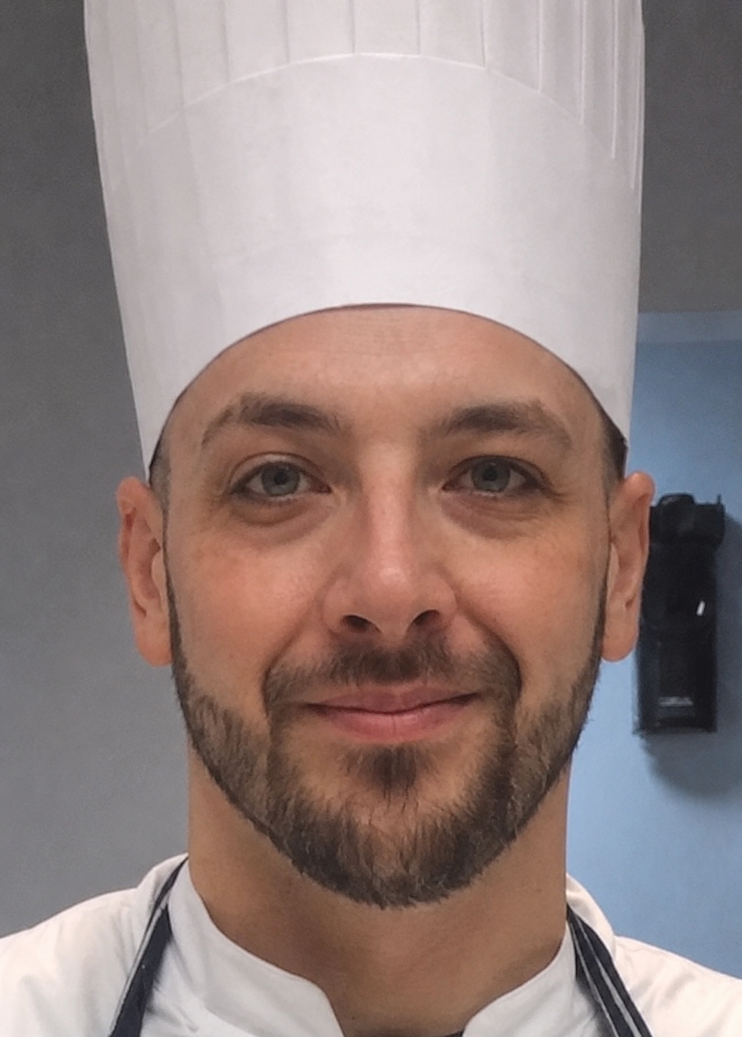Chef Josh in his chef’s uniform and toque